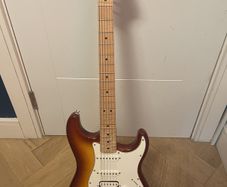 sunburst squier Stratocaster with case and whammy bar