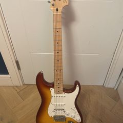 sunburst squier Stratocaster with case and whammy bar
