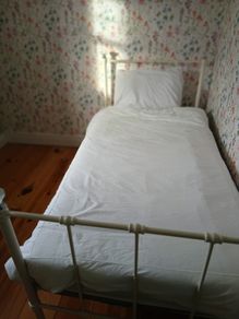 Single metal bed frame with crystal finials