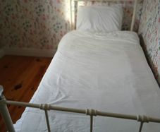 Single metal bed frame with crystal finials