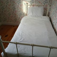Single metal bed frame with crystal finials