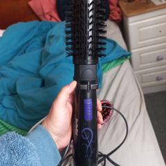 hair dryer is a brush BaByliss