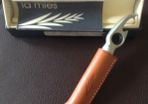 Corkscrew/ Bottle opener in Leather case.