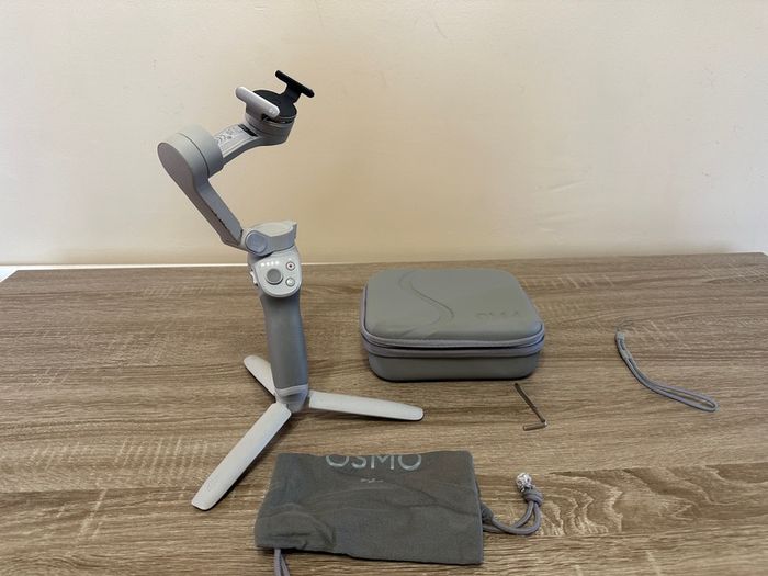 DJI Osmo Mobile 4 Gimbal and Premium carrying case
