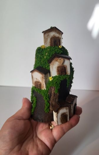 Handcrafted wooden houses on logs!