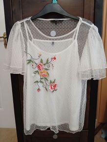 White embroidered top by Vero Moda.