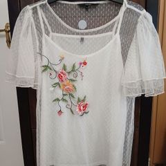 White embroidered top by Vero Moda.