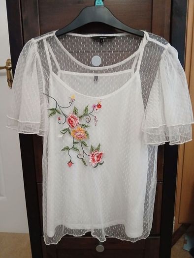 White embroidered top by Vero Moda.