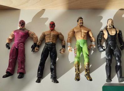 WWE Wrestling Action Figures  4 Figure Bundle
