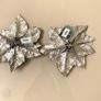 Two silver glitter poinsettia Christmas tree decorations Image 2