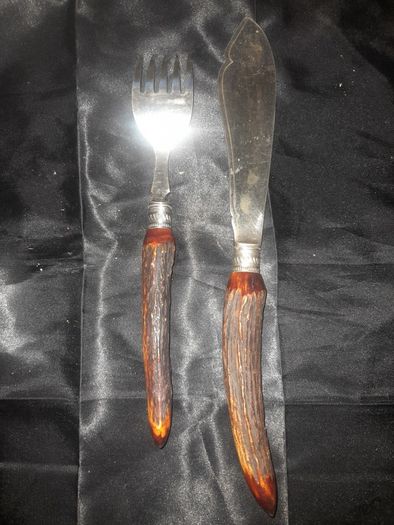A Pair of Antique Victorian Era Fish Servers with Antler Handles and Engraved Silver Plated Blades, Commonly made in Sheffield in the late 19th Century