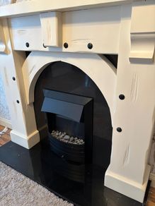 Fireplace with black granite hearth