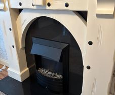 Fireplace with black granite hearth