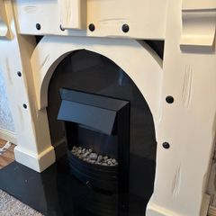 Fireplace with black granite hearth