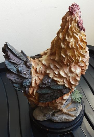 Cockerell and hen plus, around ten or 12 inches tall