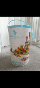 Bucket of wooden building blocks