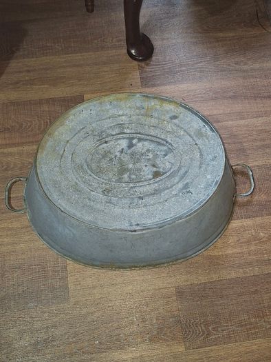 A Beautiful Large Old Galvanized Steel Wash Tub with Side Handles in nice used condition and is frequently used for Farmhouse Decor or Garden