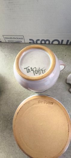 Sugar Bowl and Creamer, Hand Painted signed The Potter. po