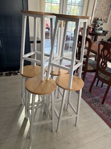 6 bar/kitchen stools - white legs, light brown wood seats.
