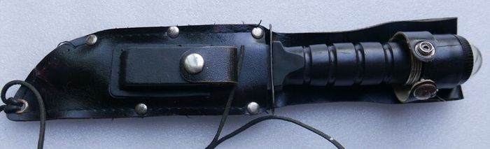 Vintage 1980s Survival Knife with compass and a storage compartment in the knife handle