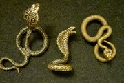 3 brass snakes.