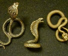 3 brass snakes.