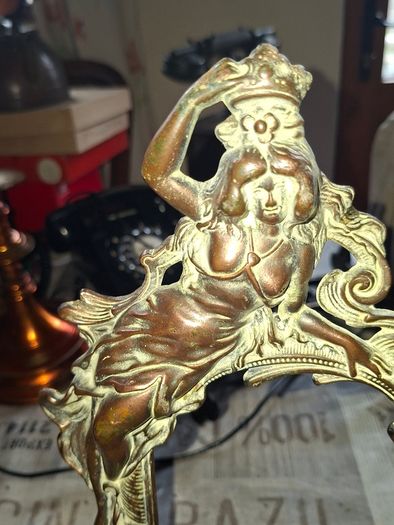 Beautiful Pair of Antique Art Nouveau Beatrice. Bronzed Photo Frames Cherub. a stunning lady lies on the top of the frame with beautiful scrollwork descending down the frame to a winged Cupid or Angel