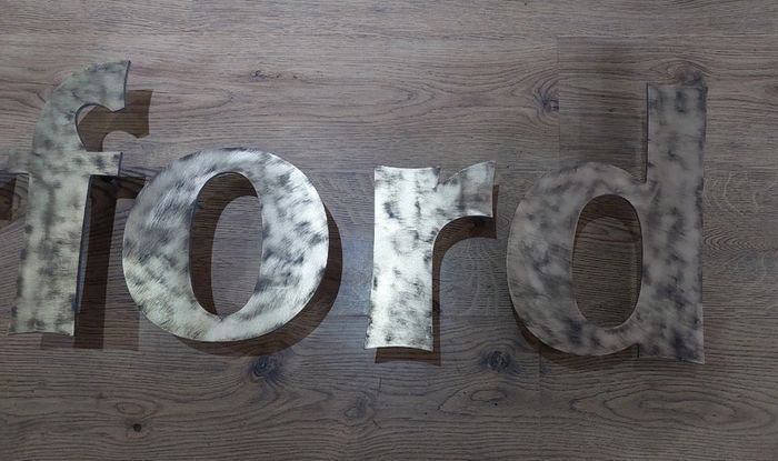 WATERFORD brass letters