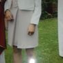 Beautiful salmon color dress, pretty lace on top with box pleat on front in mint condition only worn once on confirmation day. Image 4