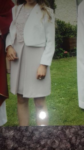 Beautiful salmon color dress, pretty lace on top with box pleat on front in mint condition only worn once on confirmation day.