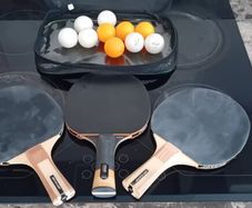 table tennis bats and balls