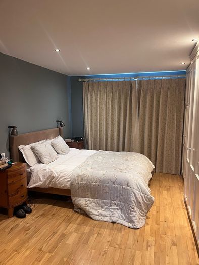 Wooden frame slated king size bed