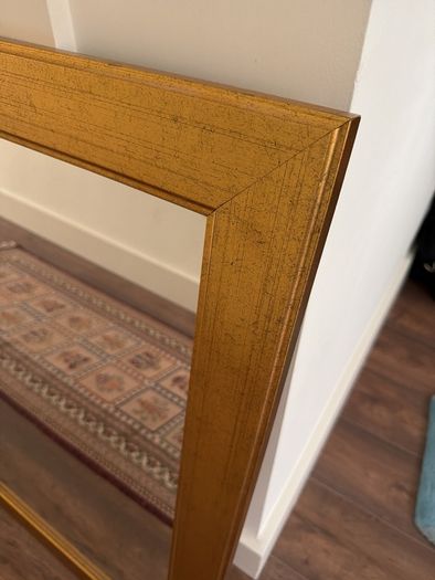 Gold finished wooden mirror