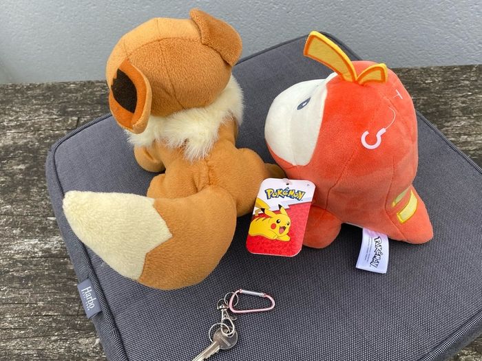 Two Pokemon plush - NEW Fuecoco & Eevee