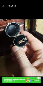 18 ct gold ring with Sapphire stone and 16 brilliant cut diamonds