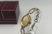 Rotary Ladies Gold Tone Oval Bracelet Mechanical Watch