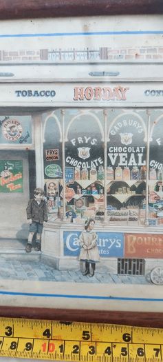 Old advertising shop front picture print ,different brands for sale, in the shop,nice for any home bar or man cave pub restaurant etc,,buyer collects thank you,, rather buyer collects with the glass ,sold as is ,,see pictures for condition