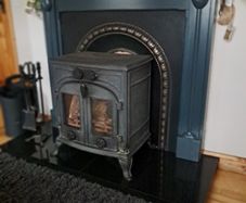 Greenes solid fuel stove and surround