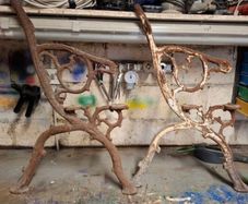 old garden  bench ends with wexford written on them