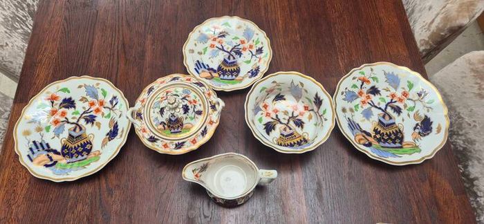 Japanese-inspired Imari pattern with cobalt blue, red, and gold gilding china