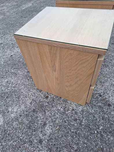 Two lovely bedside lockers with glass tops
