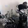 A selection of golf clubs and bags. Image 2