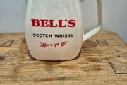 Bells whiskey, water jug, wade