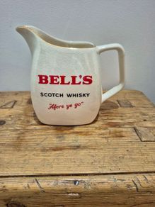 Bells whiskey, water jug, wade