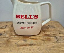 Bells whiskey, water jug, wade