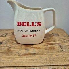 Bells whiskey, water jug, wade