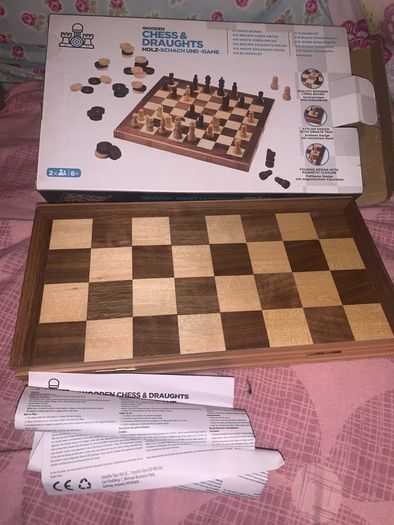 Boxed wooden chess board, prices and checkers set