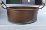 A set of old copper pots