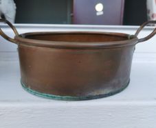 A set of old copper pots