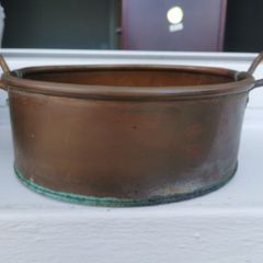 A set of old copper pots